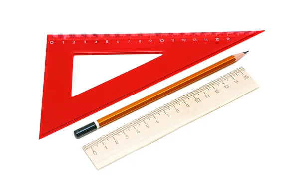 Lápis e régua sobre um fundo branco — Fotografia de Stock