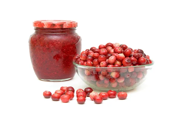 Cranberries in a glass bowl and cranberry jam — Stock Photo, Image