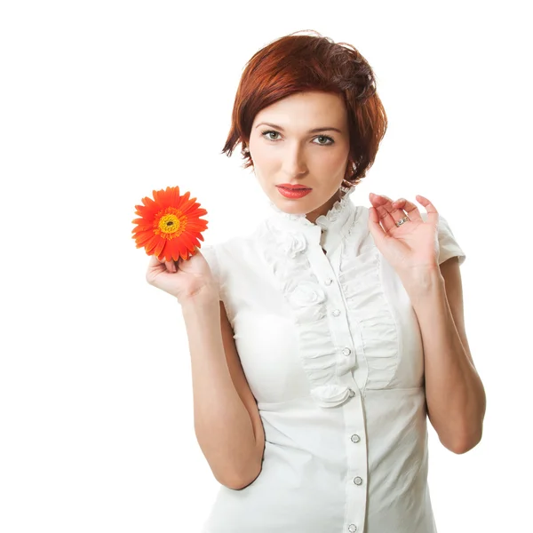 Beautiful woman with flower gerbera in her hands against white b — Stock Photo, Image