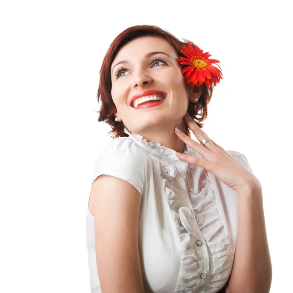 Krásná žena s květiny gerbera proti Bílému pozadí — Stock fotografie