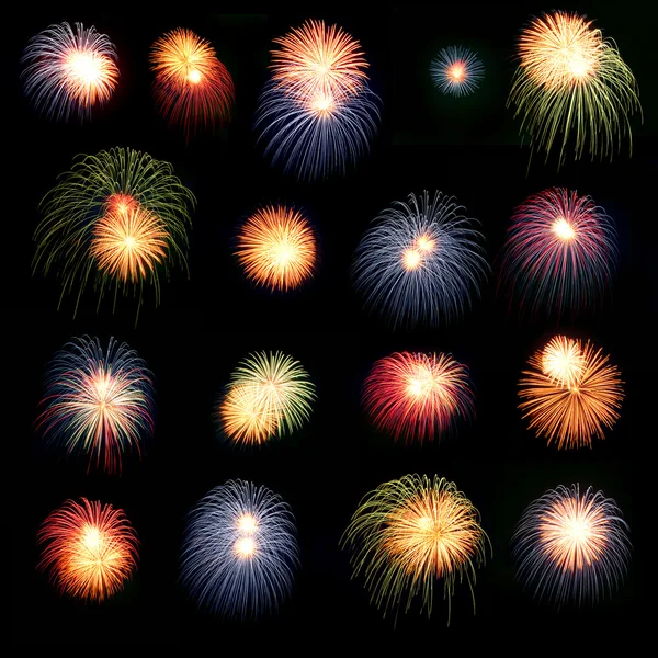 Jaskrawo kolorowe fajerwerki na nocnym niebie — Zdjęcie stockowe