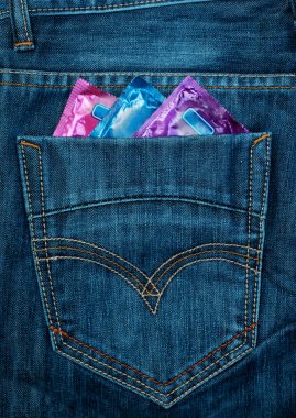 Condom in jeans pocket clipart