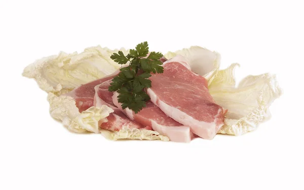 Pork in salad leaves — Stock Photo, Image