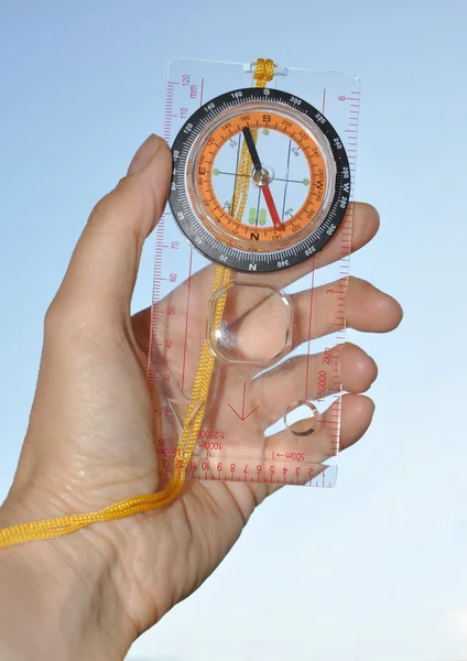 Compass in hands — Stock Photo, Image
