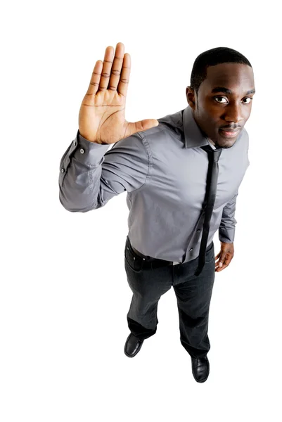 Uomo d'affari con la mano alzata — Foto Stock