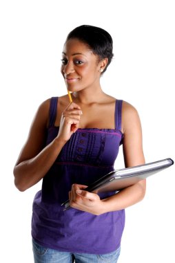 Young female student holding pencil and book clipart