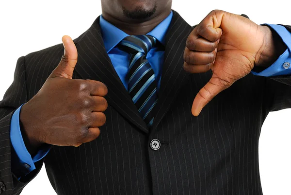 Homem de negócios mostrando polegares para cima e polegares para baixo — Fotografia de Stock
