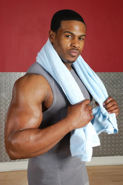 African american trainer with towel — Stock Photo, Image