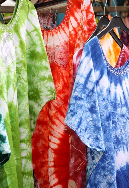 stock image African dresses colored on a market for the sale