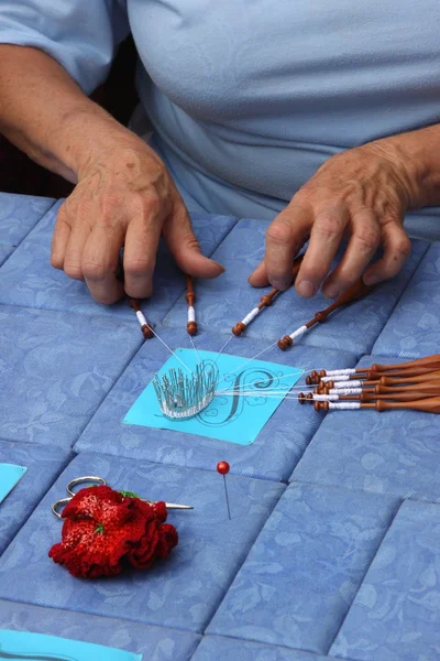 stock image Process of lace-making with bobbins