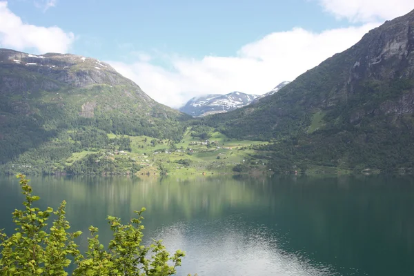 Wonderful fjord greens of norway in spring Stock Photo
