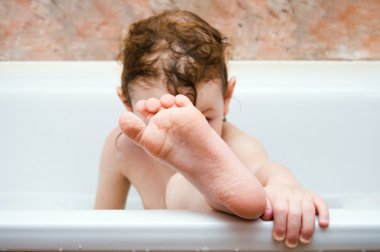 Childfoot in bathroom clipart