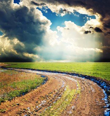 Road under dramatic sky