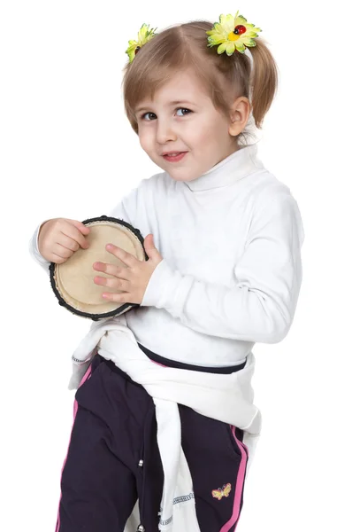 Маленькая девочка с барабаном — стоковое фото
