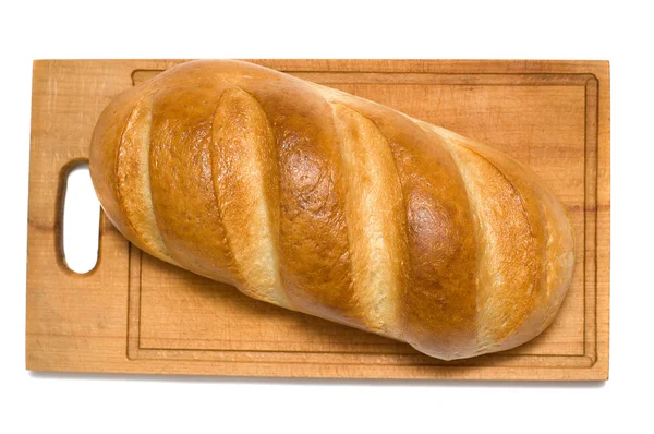 Bread on breadboard — Stock Photo, Image