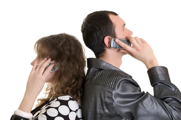 Chlapec a dívka mluví do mobilu — Stock fotografie