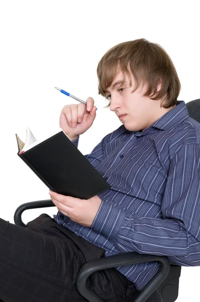Мужчина с пером и ноутбука — стоковое фото