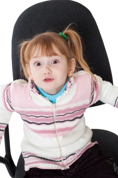 Little girl in chair — Stock Photo, Image