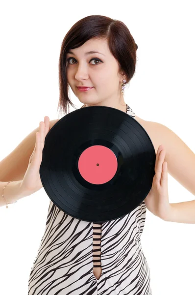 Девушка с виниловым диском — стоковое фото
