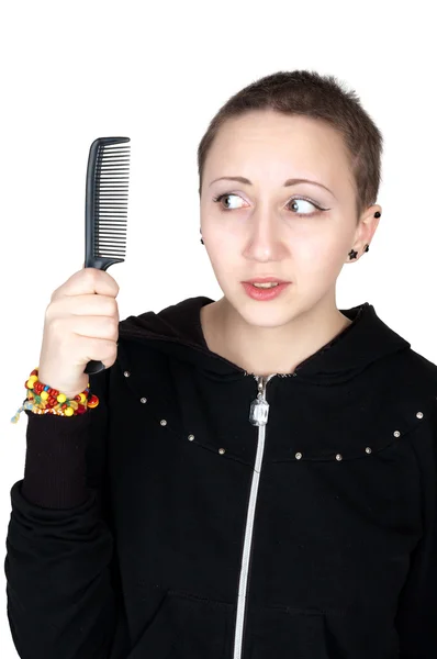 Garota de cabelos curtos com pente — Fotografia de Stock