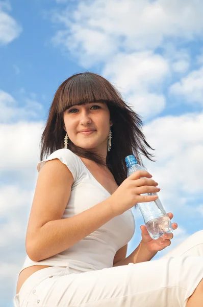 Girl with bottle — Stock Photo, Image