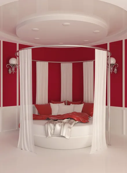Круглая кровать с занавесом в современном интерьере — стоковое фото