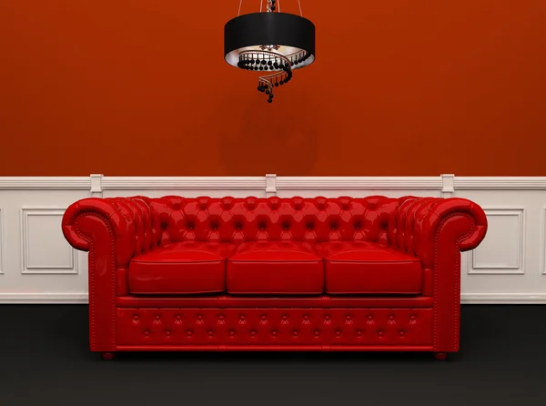 Red leather sofa with chandelier in original interior — Stock Photo, Image