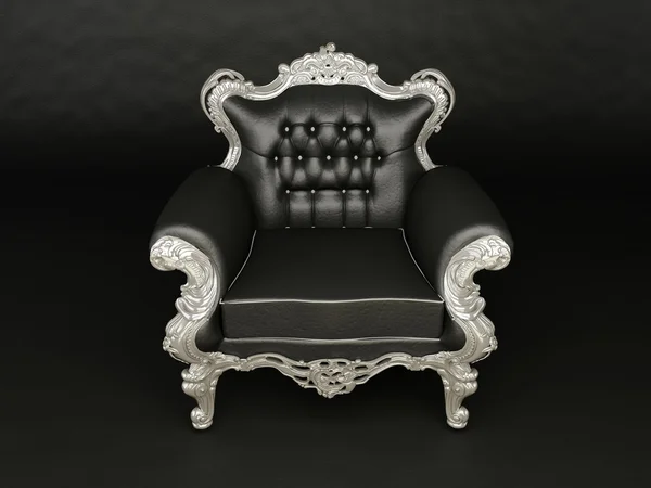 Poltrona preto luxuoso com moldura de prata no fundo preto — Fotografia de Stock