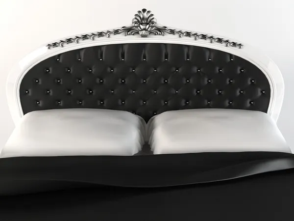 Luxurious headboard with decorative frame. Bed. — Stock Photo, Image