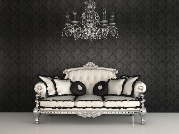 Sofá real con almohadas y lámpara de araña en un lujoso ingenio interior — Foto de Stock