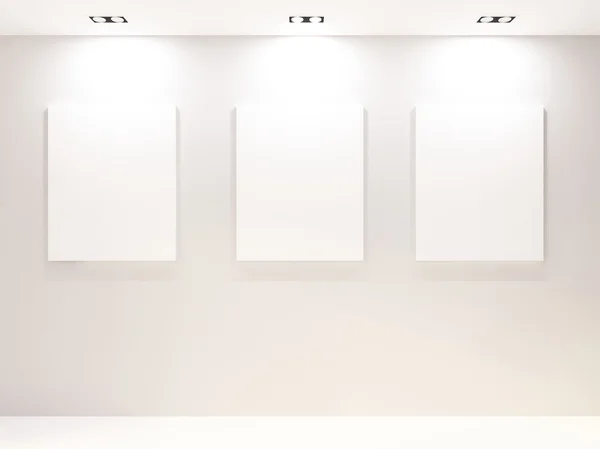Interiér galerie s prázdné rámečky na bílé zdi — Stock fotografie