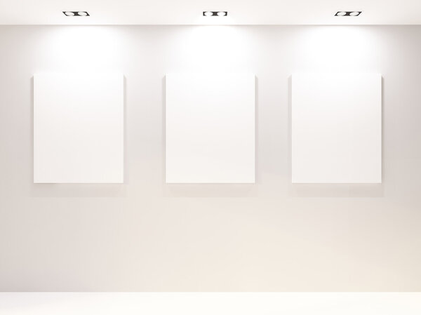Gallery Interior with empty frames on white wall