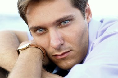 Portrait of handsome man, close up of young businessman, outdoors clipart