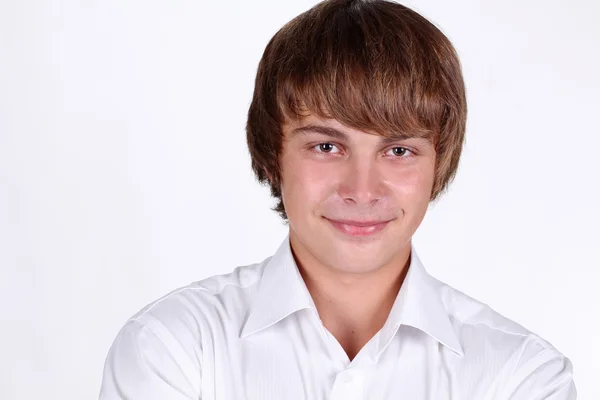 Porträtt av leende stilig ung man, student — Stockfoto