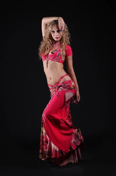 Beautiful curly blonde in the active Arab Dance — Stock Photo, Image