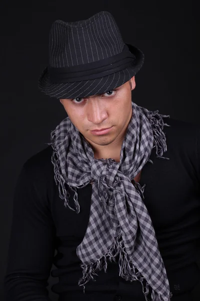 stock image Portrait of man in b bandana on dark background