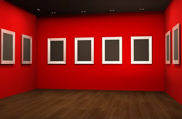 Perspectiva do interior da galeria com molduras vazias em paredes vermelhas — Fotografia de Stock