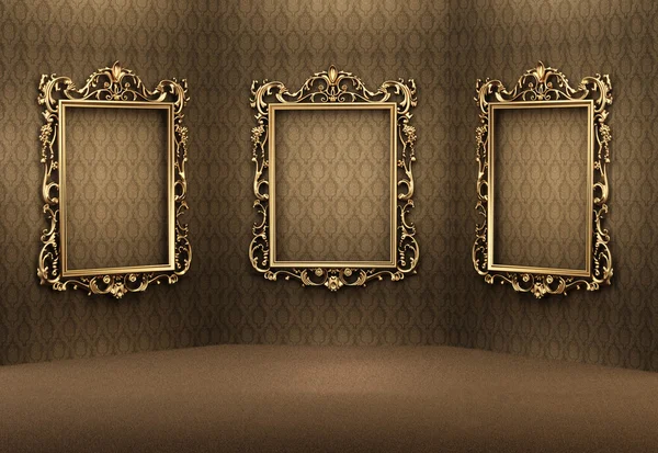 Empty golden frames on the wall in luxurious interior. Royal apartment. Sho — Stock Photo, Image