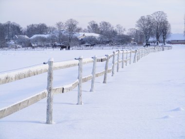 Old wooden farm fence in winter clipart
