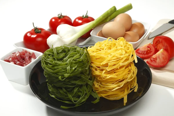 Tagliatelle, a traditional kind of Italian pasta — Foto de Stock