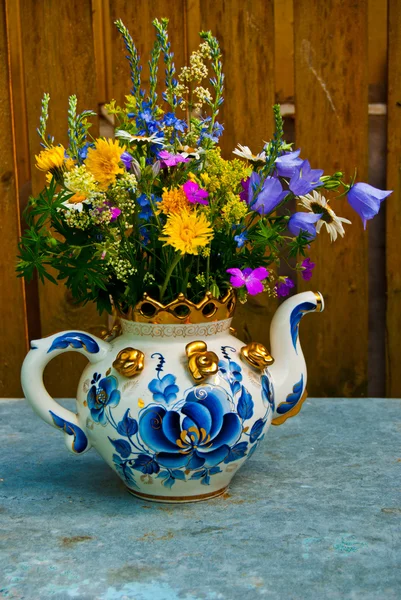 Bouquet in a teapot — Stock Photo, Image