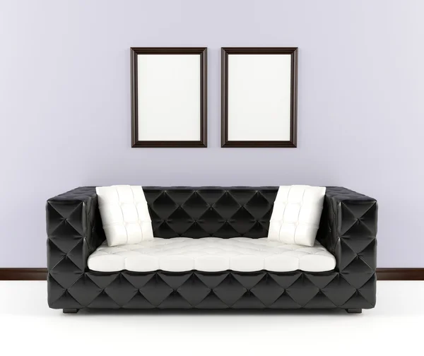 Black leather sofa with pillows in the interior — Stock Photo, Image