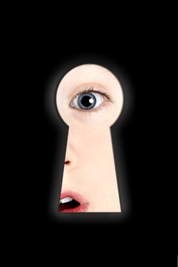 A boy looking in a keyhole clipart