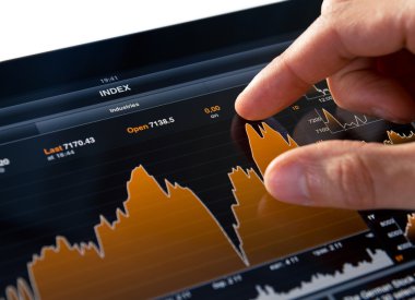 Analyzing Stock Market Chart clipart