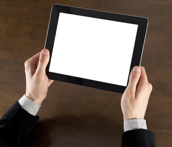 Empresario que sostiene la tableta en blanco PC — Foto de Stock
