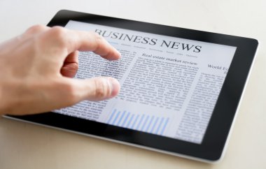 Business News On Tablet PC clipart