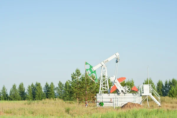 stock image Oil pump in the field