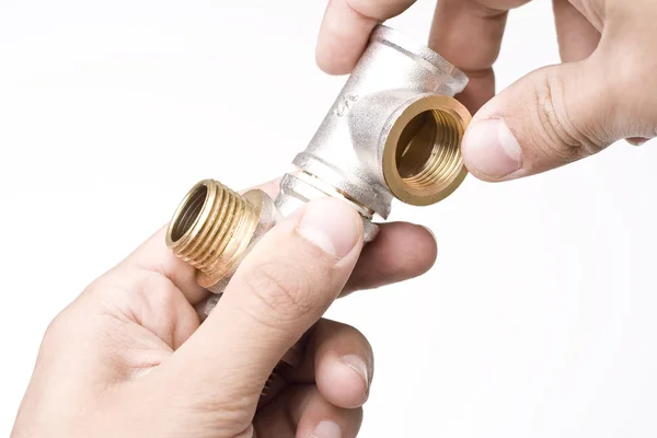 Connettori di tubi idraulici in mano — Foto Stock