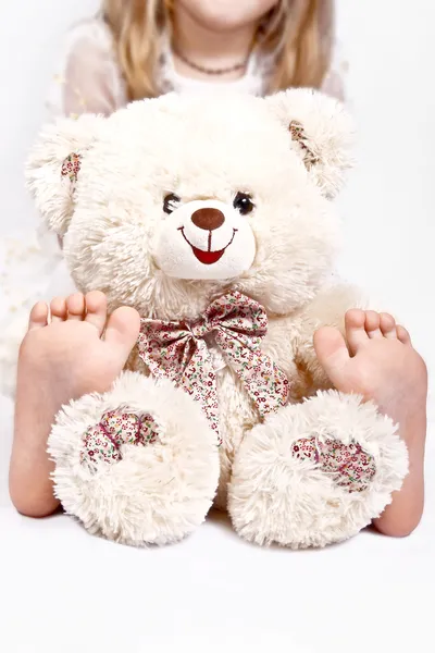 stock image Little girl holding teddy bear