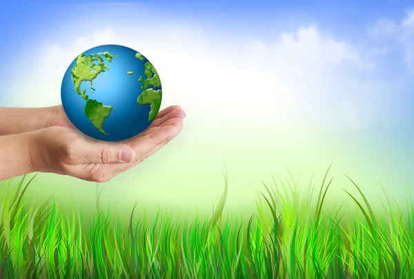 Mãos a segurar o globo. Conceito de energia ambiental . Fotografias De Stock Royalty-Free